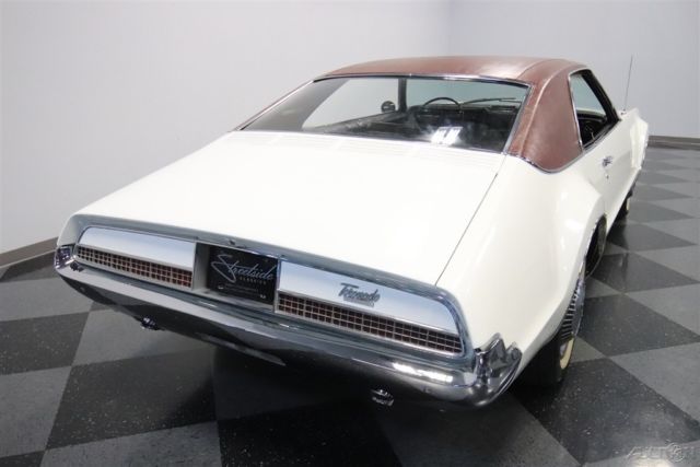 1967 White Oldsmobile Toronado