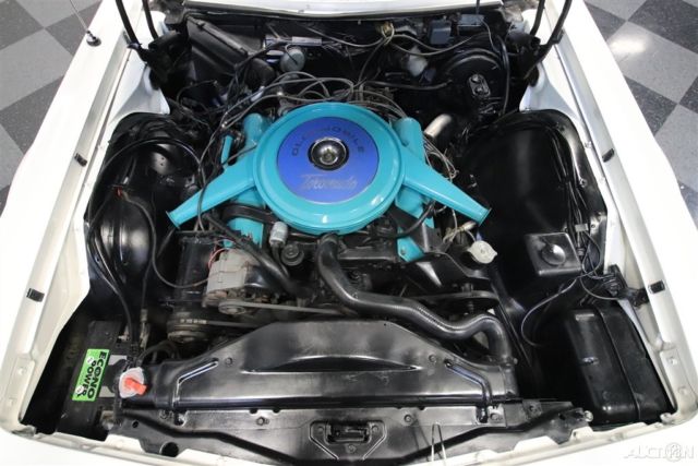 1967 White Oldsmobile Toronado