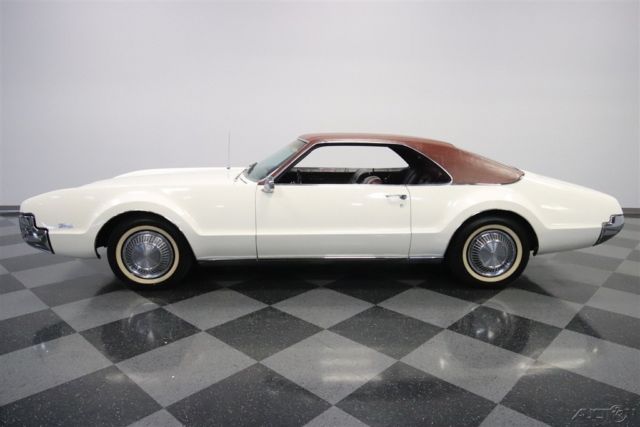 1967 White Oldsmobile Toronado
