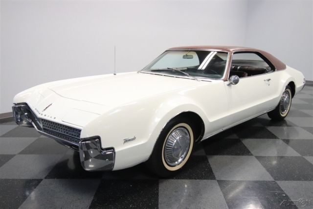 1967 White Oldsmobile Toronado