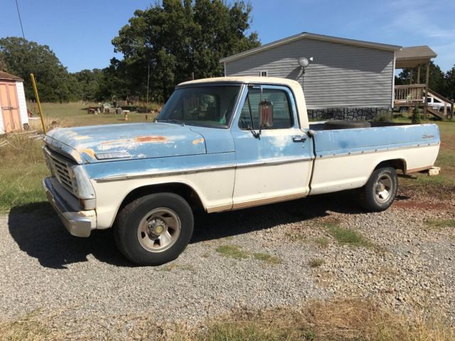 1967 blue/white Ford F-100 Standard Cab Pickup