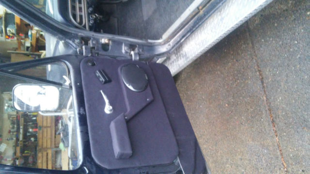 1967 dark blue Ford F-250 pickup