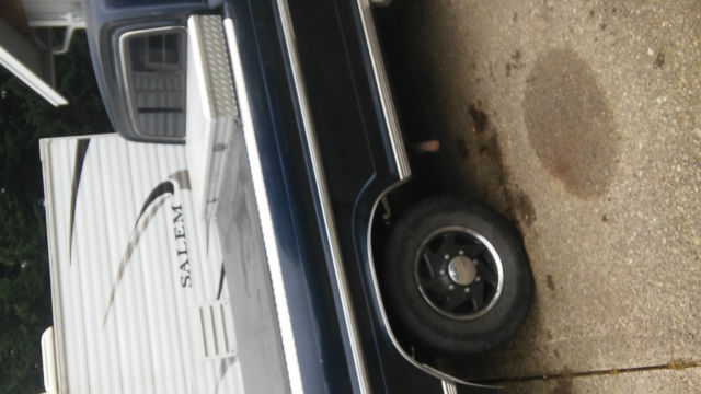 1967 dark blue Ford F-250 pickup