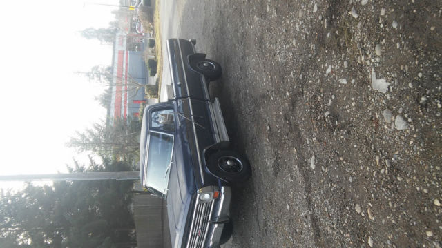 1967 dark blue Ford F-250 pickup