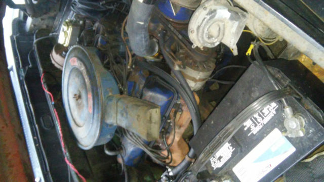 1967 dark blue Ford F-250 pickup