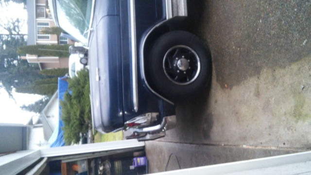 1967 dark blue Ford F-250 pickup