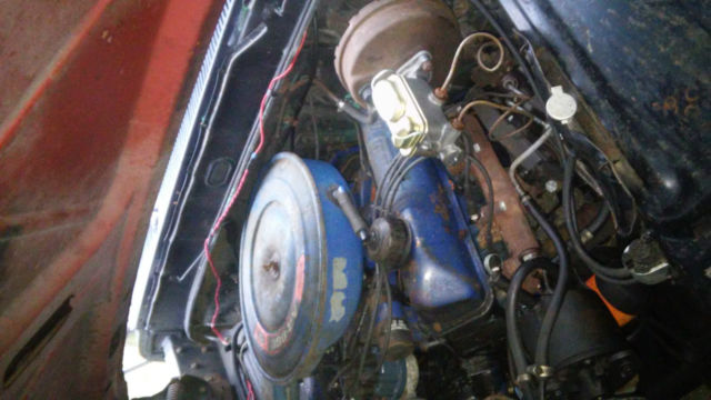 1967 dark blue Ford F-250 pickup