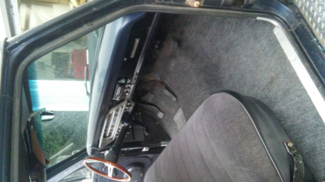 1967 dark blue Ford F-250 pickup