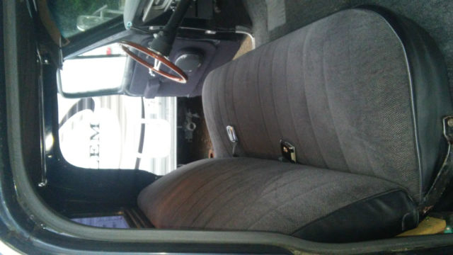 1967 dark blue Ford F-250 pickup