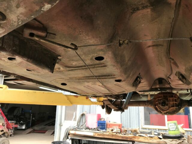 1967 green/white Ford Mustang fastback