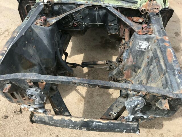 1967 green/white Ford Mustang fastback