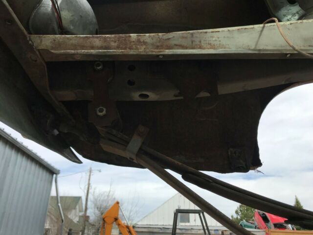 1967 green/white Ford Mustang fastback