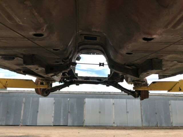 1967 green/white Ford Mustang fastback