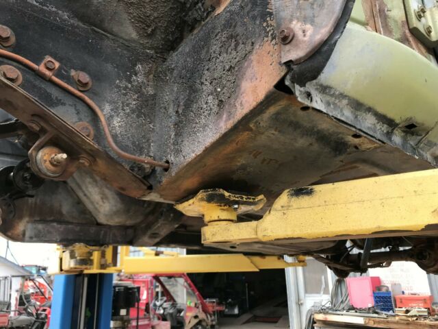 1967 green/white Ford Mustang fastback