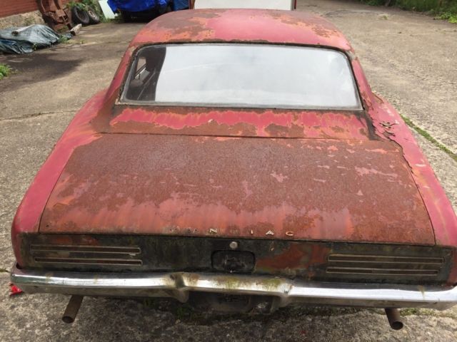 1967 Rust Pontiac Firebird coupe
