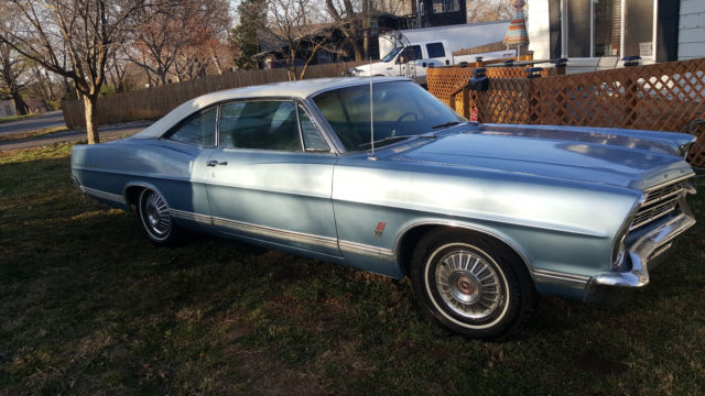 1967 blue Ford Galaxie Coupe
