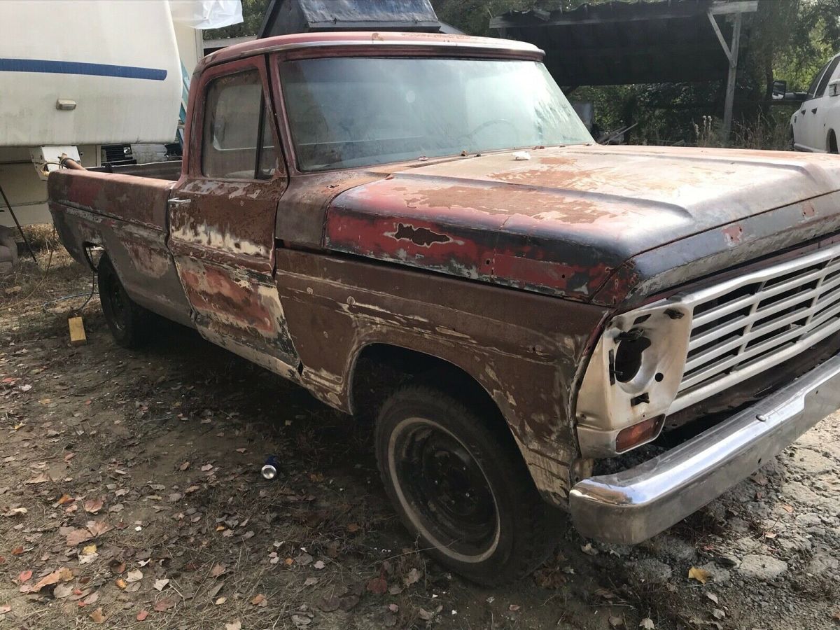 1967 Red Ford F-100 Standard Cab Pickup