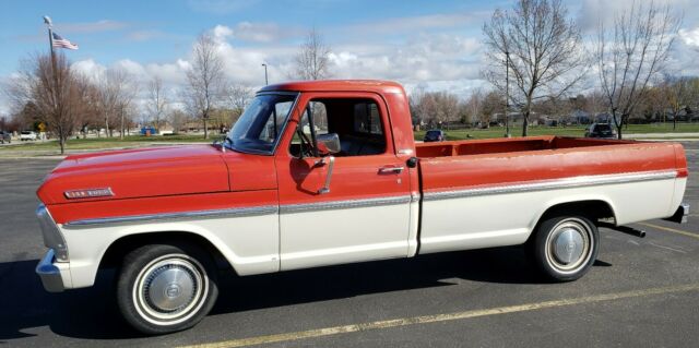 1967 red/white Ford F-100 Standard Cab Pickup