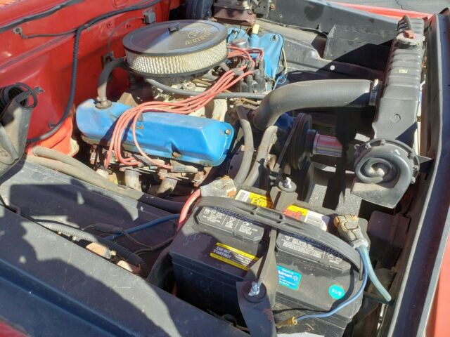 1967 red/white Ford F-100 Standard Cab Pickup