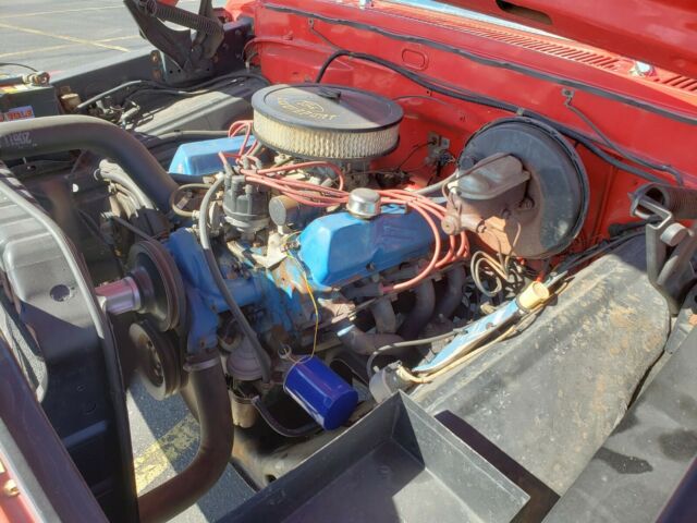 1967 red/white Ford F-100 Standard Cab Pickup