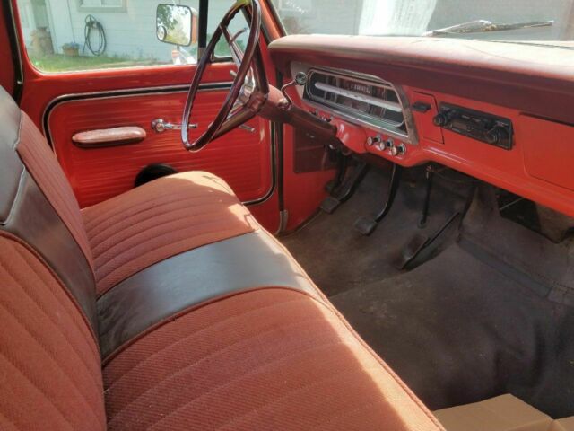 1967 red/white Ford F-100 Standard Cab Pickup