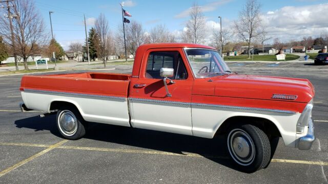 1967 red/white Ford F-100 Standard Cab Pickup