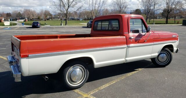 1967 red/white Ford F-100 Standard Cab Pickup