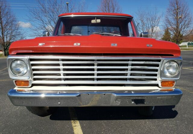 1967 red/white Ford F-100 Standard Cab Pickup