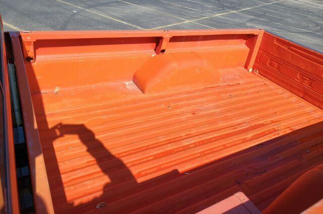 1967 red/white Ford F-100 Standard Cab Pickup