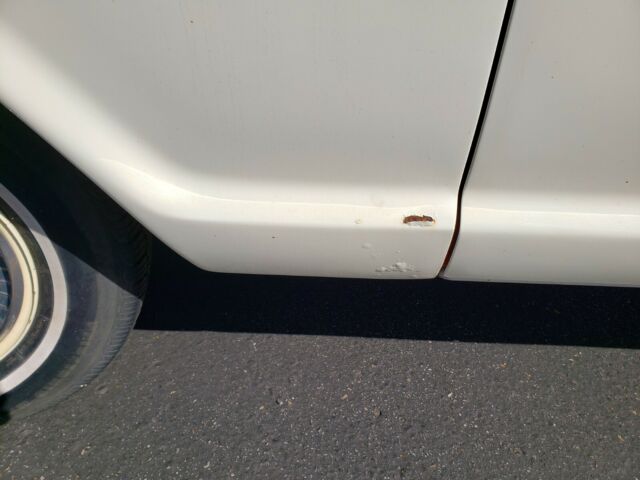 1967 red/white Ford F-100 Standard Cab Pickup