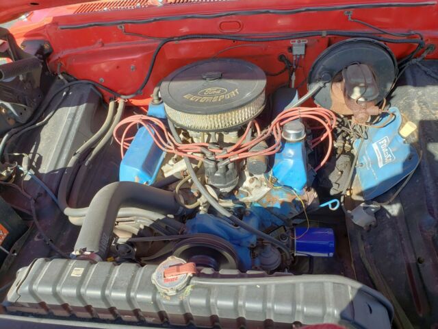 1967 red/white Ford F-100 Standard Cab Pickup