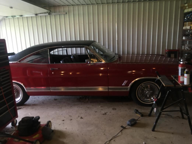 1967 red Ford Galaxie 2 dr hard top