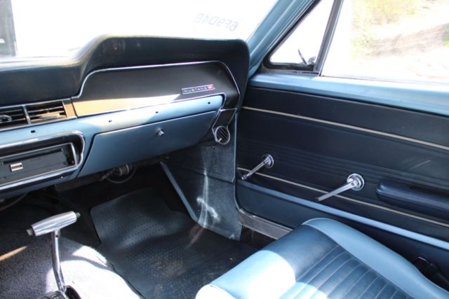 1967 blue on white Ford Mustang Coupe
