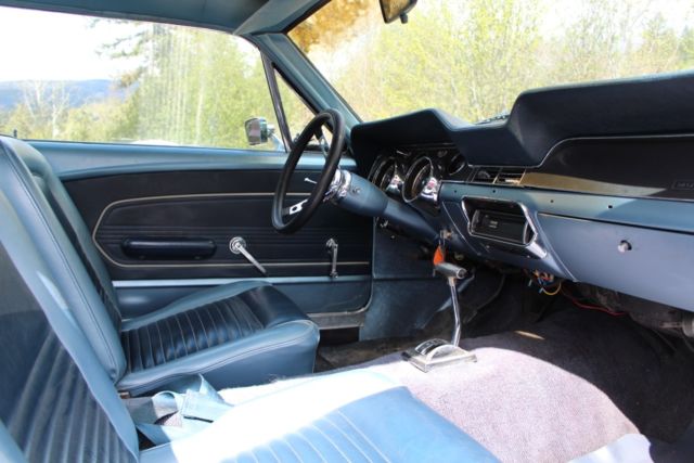 1967 blue on white Ford Mustang Coupe