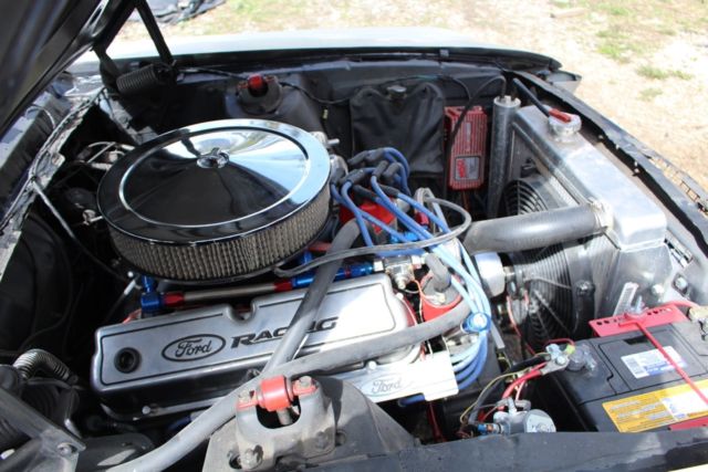 1967 blue on white Ford Mustang Coupe