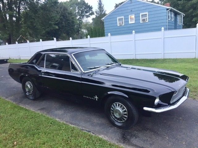 1967 black Ford Mustang coupe