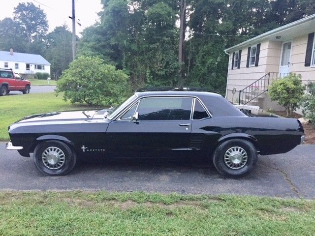 1967 black Ford Mustang coupe