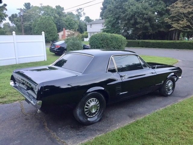 1967 black Ford Mustang coupe