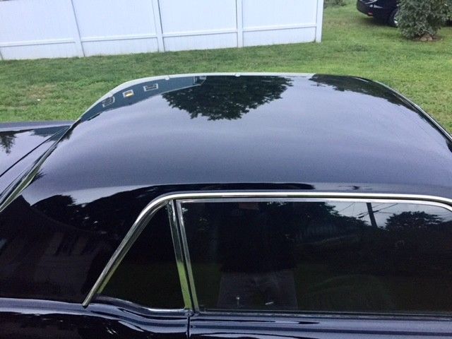 1967 black Ford Mustang coupe