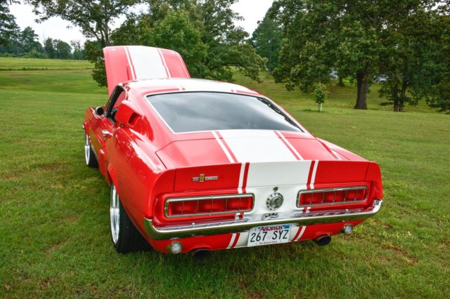 1967 Ford Race Red with Performance White Stripes Ford Mustang Fastback
