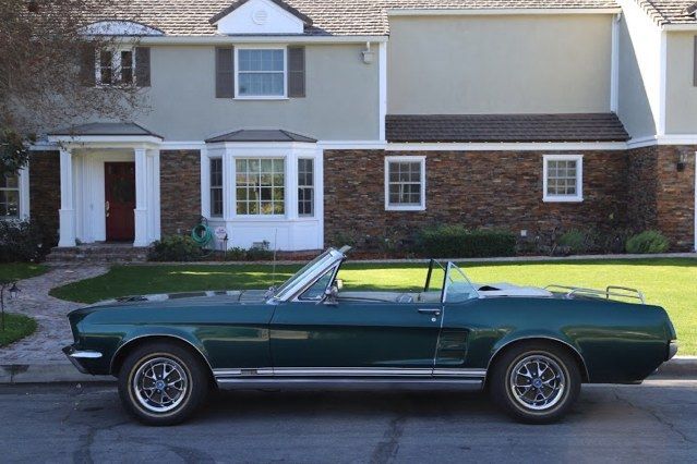 1967 green Ford Mustang Convertible