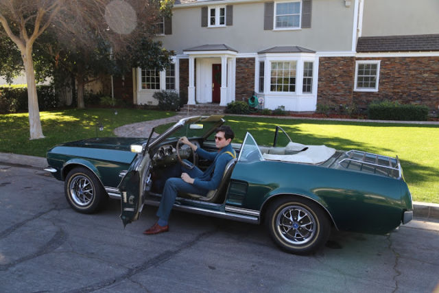 1967 green Ford Mustang Convertible