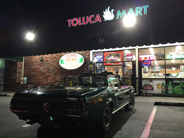 1967 green Ford Mustang Convertible