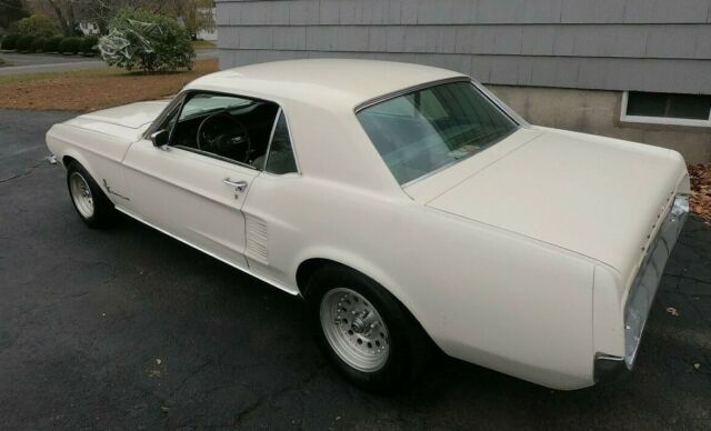 1967 white Ford Mustang Coupe