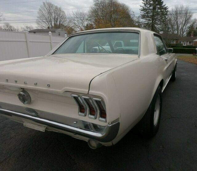 1967 white Ford Mustang Coupe