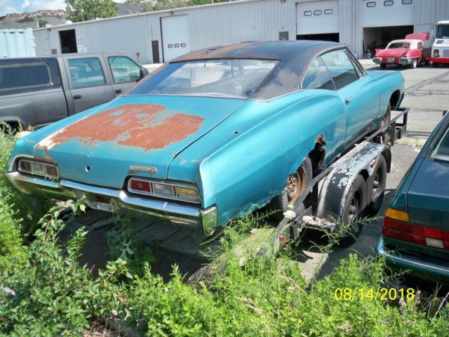 1967 Teal Chevrolet Impala Coupe