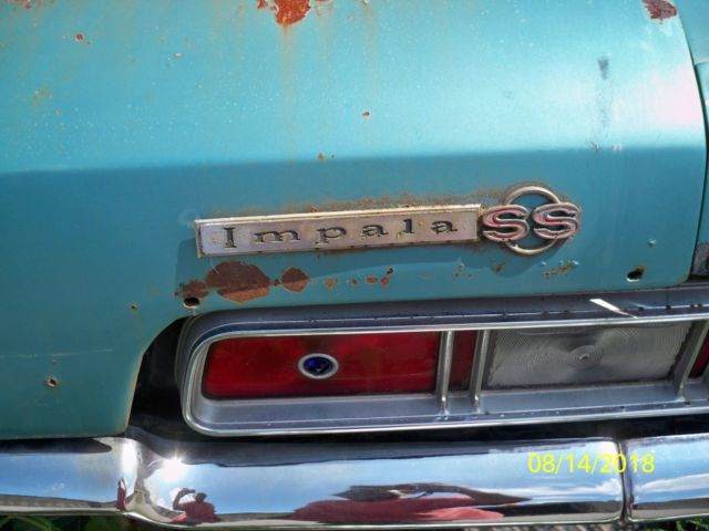 1967 Teal Chevrolet Impala Coupe