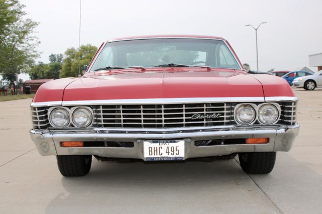 1967 Red Chevrolet Impala Coupe