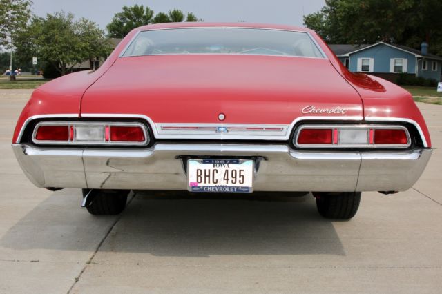 1967 Red Chevrolet Impala Coupe