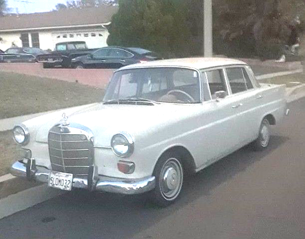 1967 cream Mercedes-Benz 200-Series